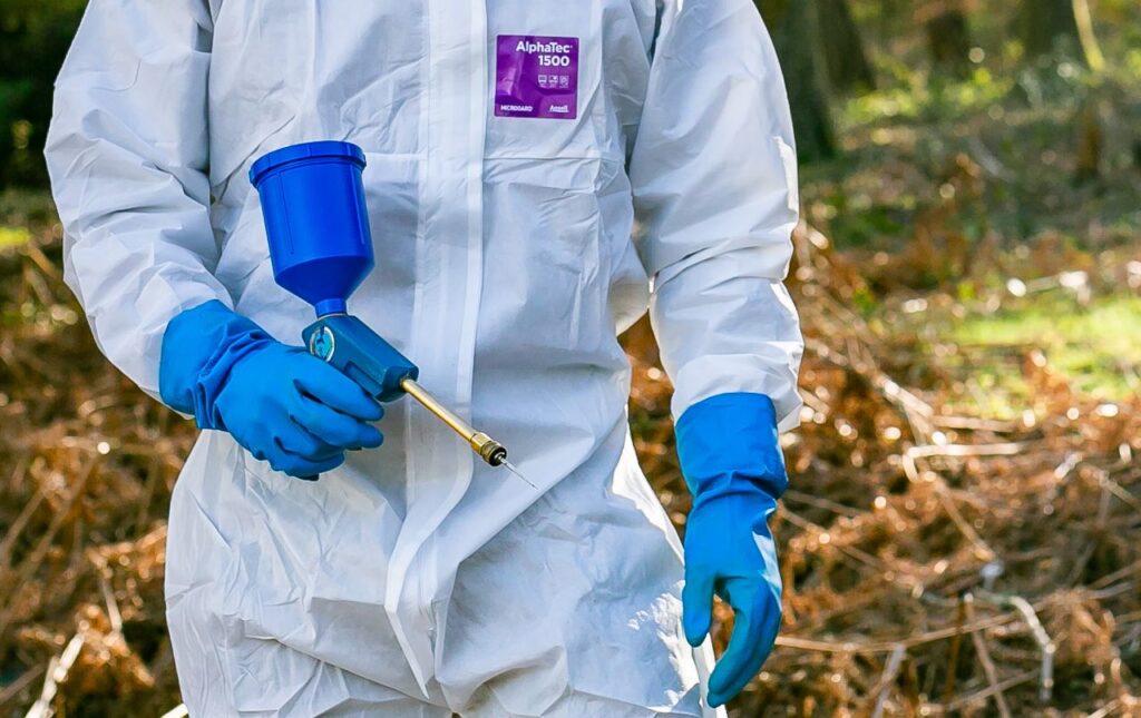 Invasive Weed Management Staff In PPE With Tools